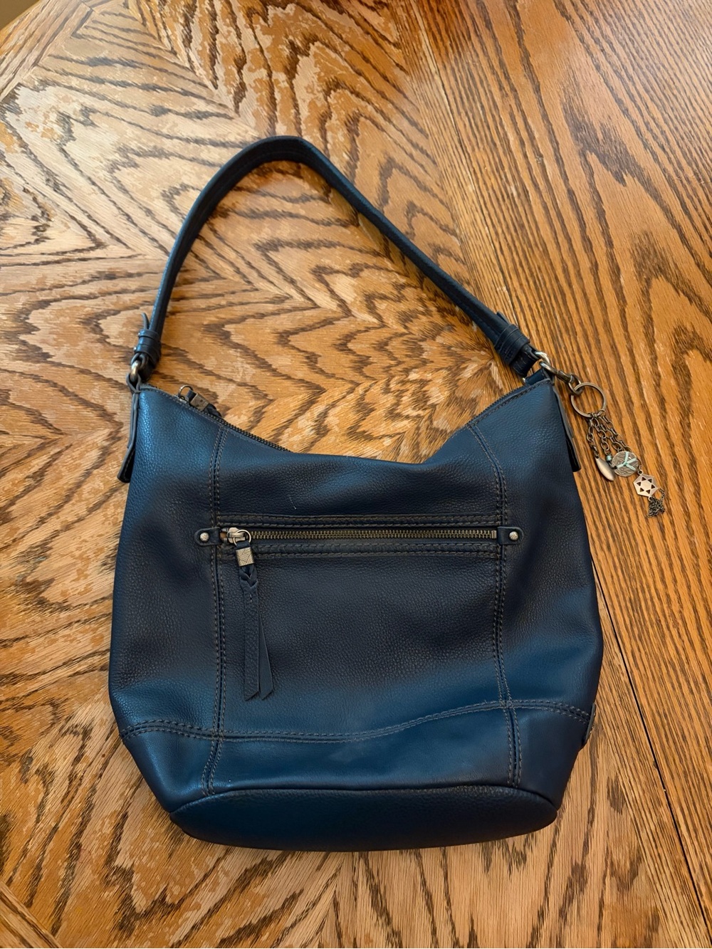 The Sak Navy Blue Leather Hobo Type Bag
Bag in Like New Condition